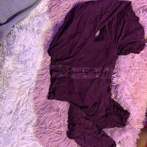 Plumb cropped top with cross cross design in front